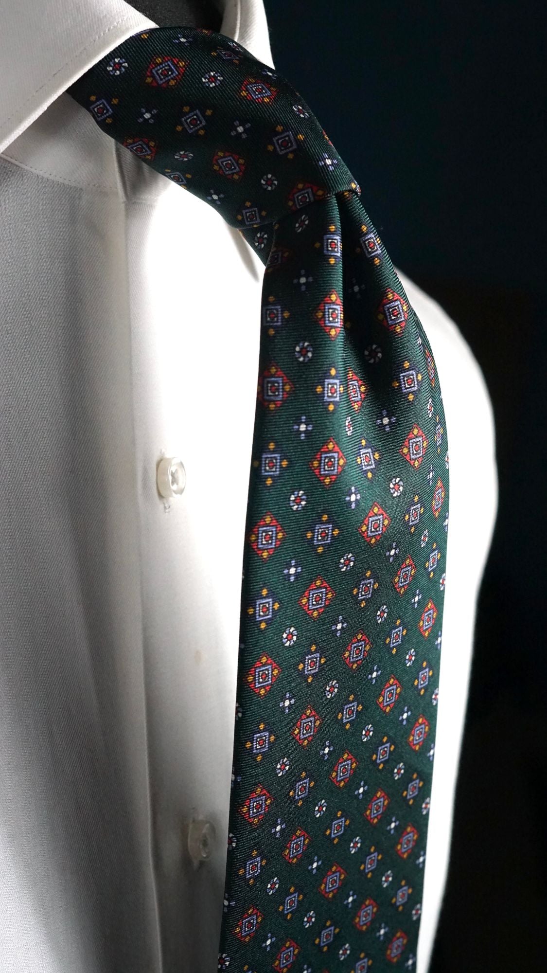 Side view of the Benedetta green foulard silk tie