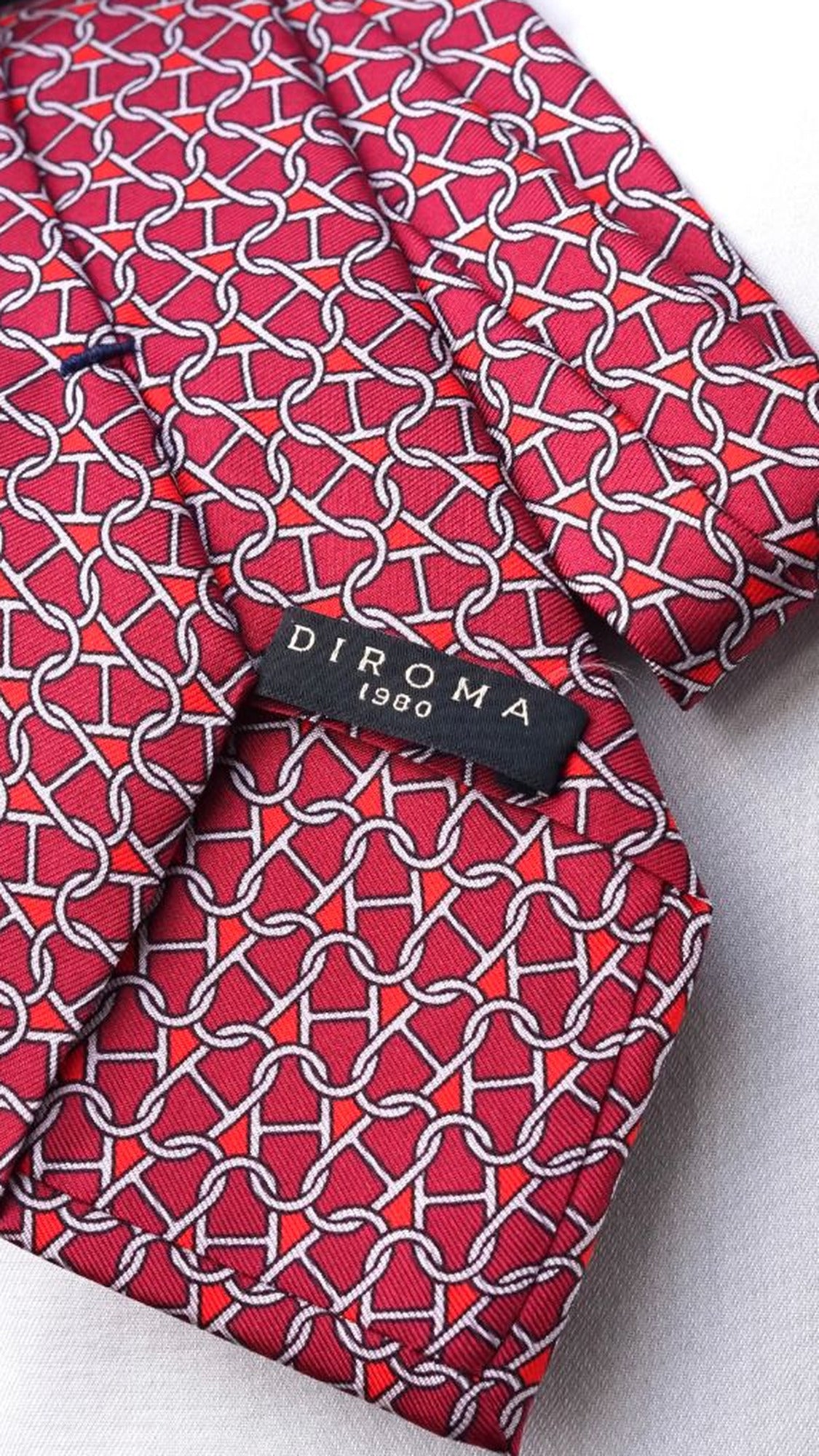 DIROMA 1980 label on the Rosalba red chain-link silk tie